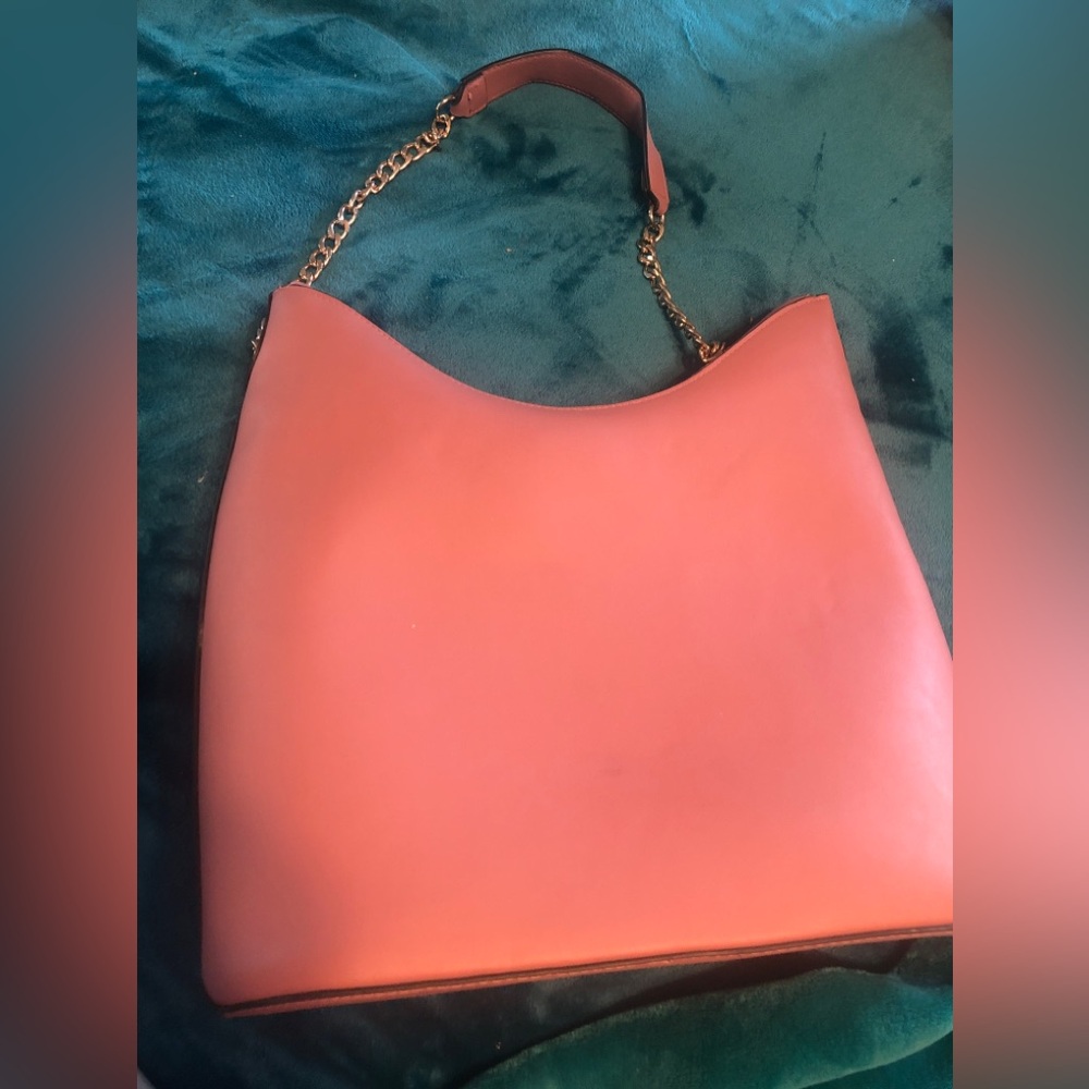 This is a mauve pink with chain shoulder strap
